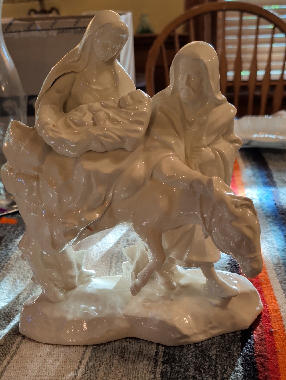 White Ceramic Nativity Sculpture Featuring Mary, Joseph and Infant